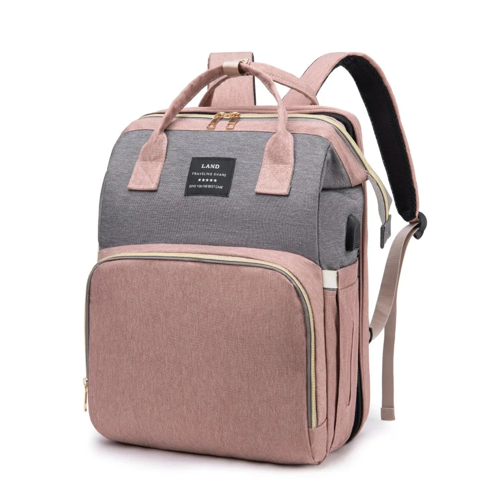 Bolsa de viaje todo en uno para mamá con cuna y almacenamiento de artículos esenciales para bebé